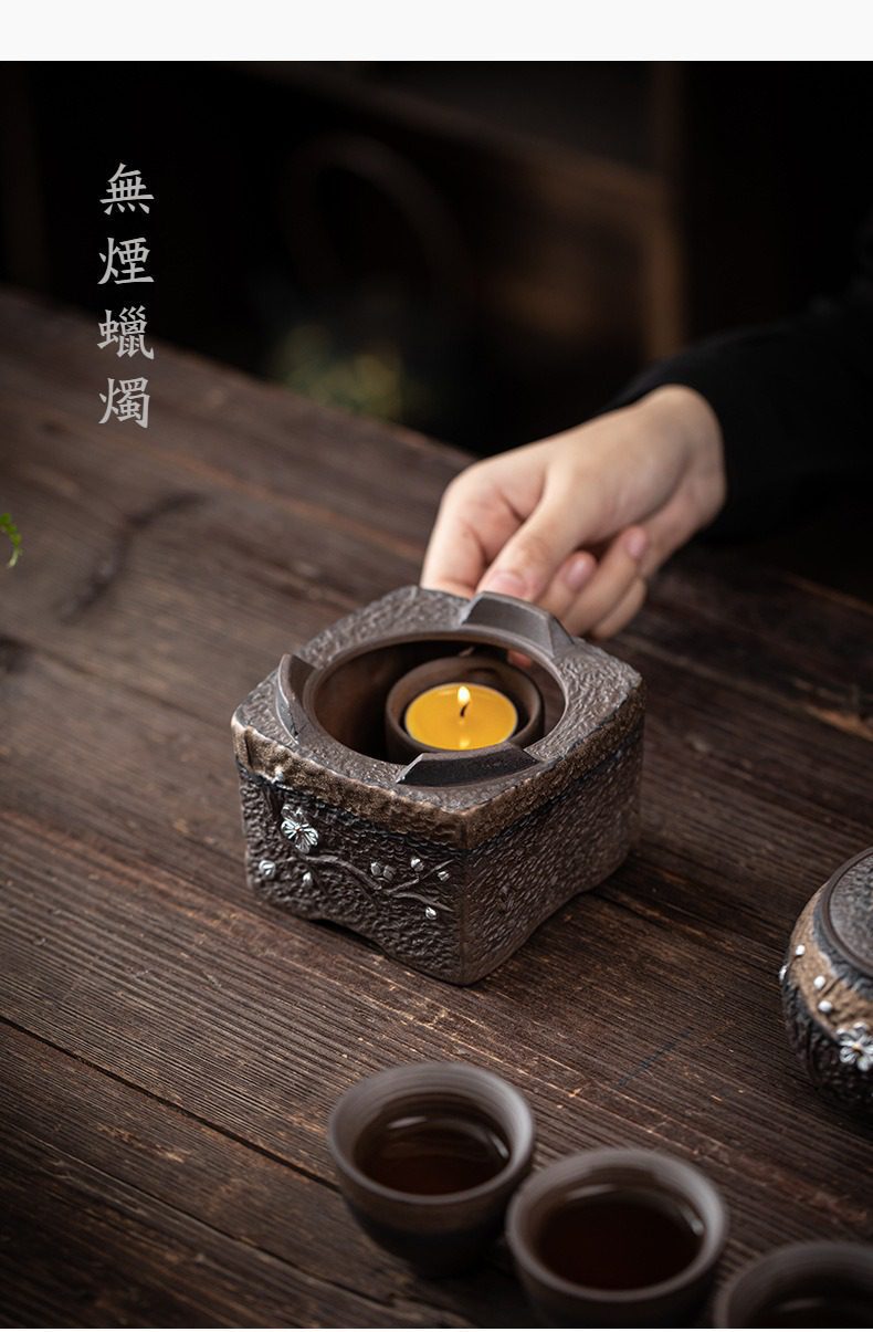 古早燒暗香溫茶爐，南山居復古粗陶溫茶爐，方形壺承設計，表面梅花浮雕工藝精緻，搭配無煙蠟燭營造溫馨品茗氛圍。