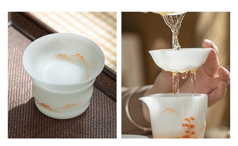 白皙玉泥鴻運當頭茶具套裝禮盒，南山居高品質陶瓷手繪山水茶濾與公道杯，茶湯透過濾網，清澈流入公杯。
