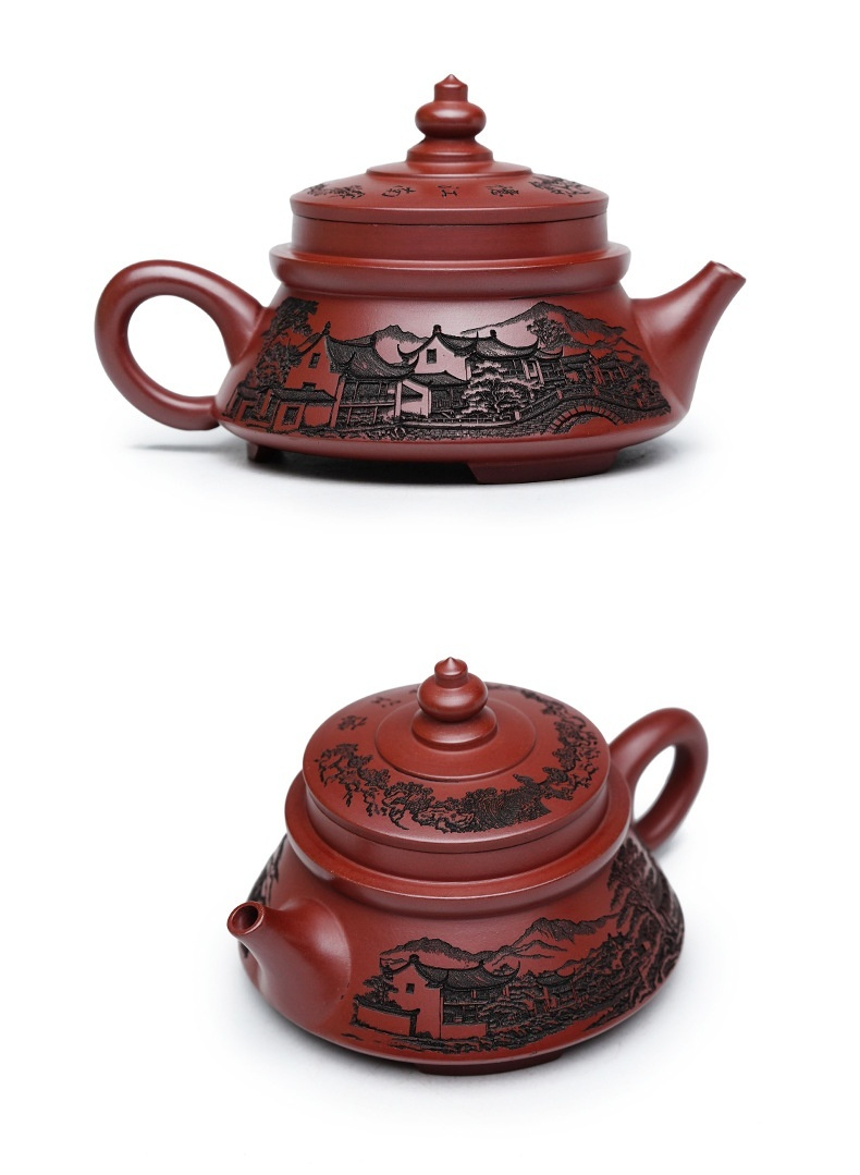 宜興紫砂壺原礦龍血砂寶塔壺(240ml)，南山居手工紫砂扁腹壺，壺身浮雕山水亭閣，泥色古樸雅緻，質感溫潤。
